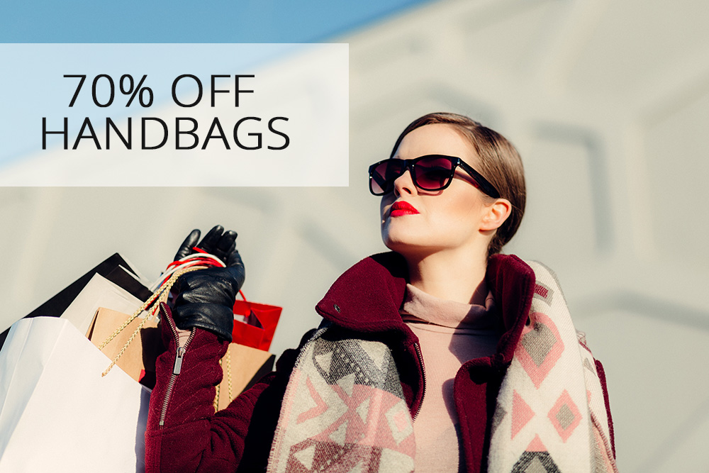 70% off handbags - lady with sunglasses holding shopping bags