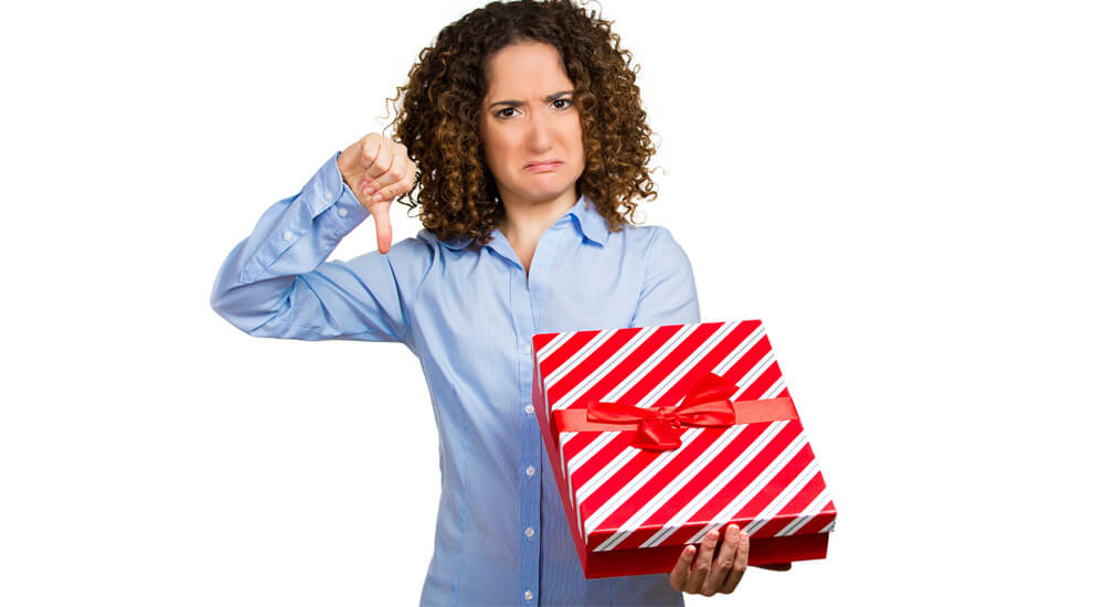 a lady that is unhappy with her gift
